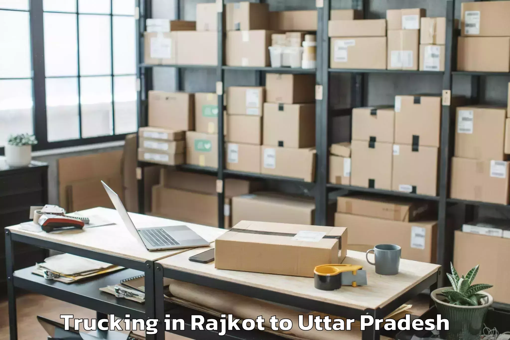 Professional Rajkot to Charkhari Trucking